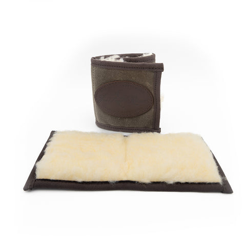 Trifold fly wallet sitting folded next to open bifold fly wallet