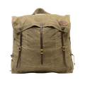 A large traditional style waxed canvas canoe pack with full-grain leather and solid brass hardware. 