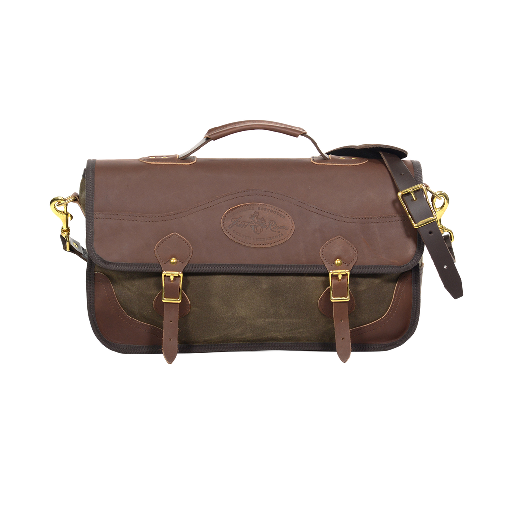 Classic brief bag with a premium leather flap closure with a leather strap and solid brass buckle .