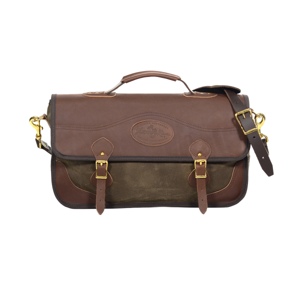 Classic brief bag with a premium leather flap closure with a leather strap and solid brass buckle .