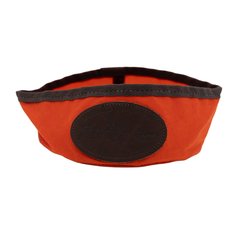 Orange foldable dog dish.