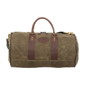Classic round shaped duffel bag made from 18 ounce waxed canvas, full grain leather, and solid brass hardware.