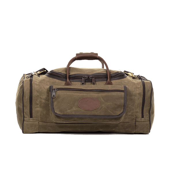 Waxed canvas luggage bag with large exterior pockets and leather handles