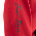 A close up view of the Frost River script logo on the right sleeve. 