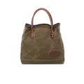 Waxed canvas tote with brown leather handles.