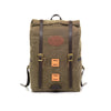 Front view of backpack fully packed to show expansion, and the two front leather lashing squares for additional leather straps to be added.