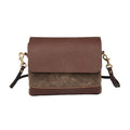 Medium to small purse with a premium leather flap cover that looks good, but also protects your items.