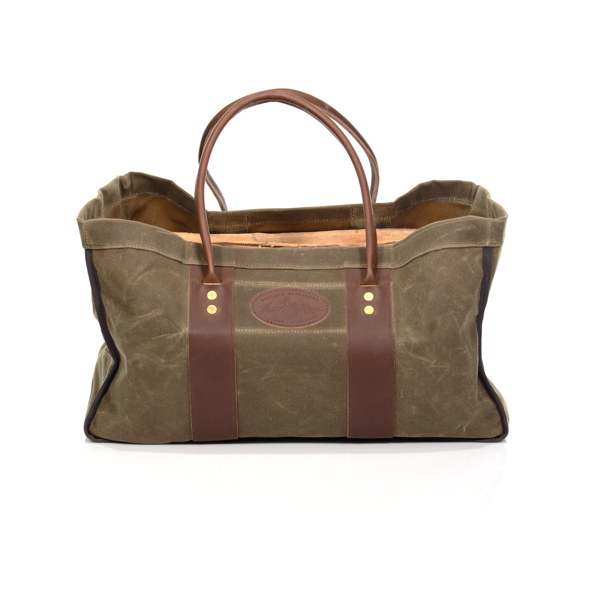 Made in the USA with durable waxed canvas, premium leather, and solid brass.