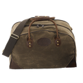 Travel luggage bag, handmade with waxed canvas. Featuring a cotton webbed, adjustable shoulder strap.