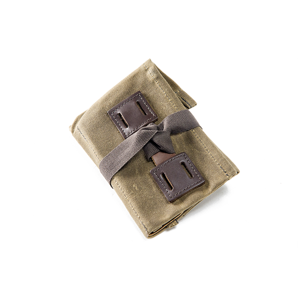 The available leather lashing squares allows the addition of leather buckle straps to the tool roll can be striped to a bike or other items.