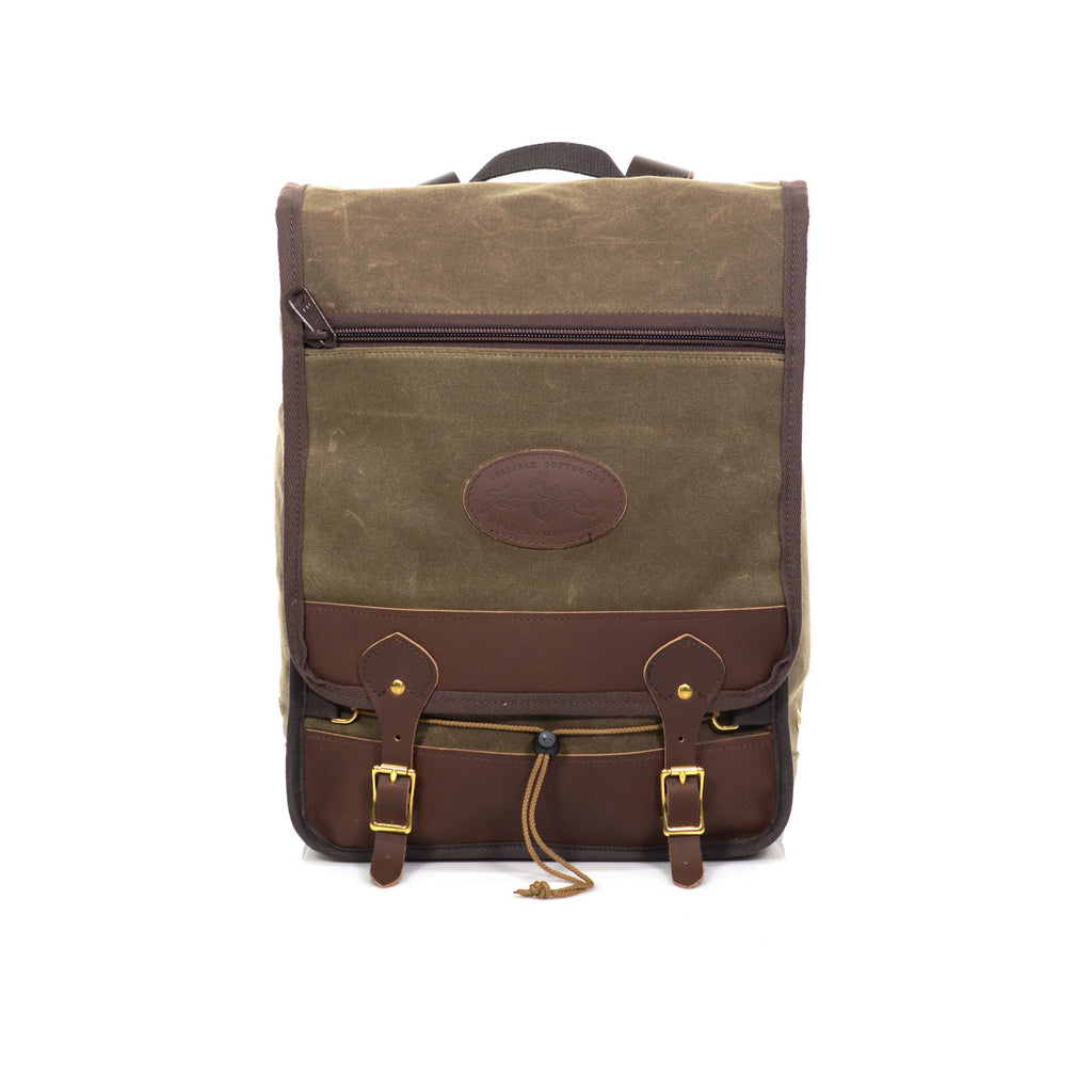 The Premium Mesabi Range Daypack on the front has our durable waxed canvas mixed with our premium leather. With a zipped pocket in the front.