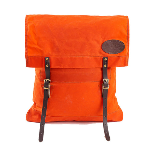 The durable and water resistant waxed canvas will protect your items from the elements.