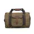 Durable, waxed canvas, duffle luggage bag with hide-a-way backpack straps.