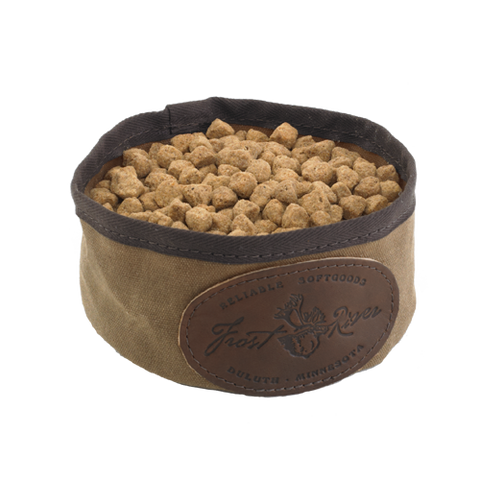 A collapsible dog bowl can be used for food or water.