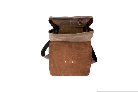 Made from premium materials this day pack  has a large zippered main compartment and includes a clip to hang key internally.