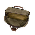 The main compartment of the bag is open and spacious with a heavy duty zipper for securing.