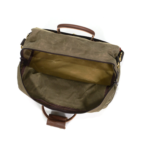 The main compartment of the bag is open and spacious with a heavy duty zipper for securing.