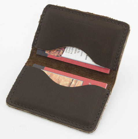 Either side is sized for standard credit cards and lD. Materials sourced within the USA, handcrafted in Duluth MN, and made by Frost River Trading Co.