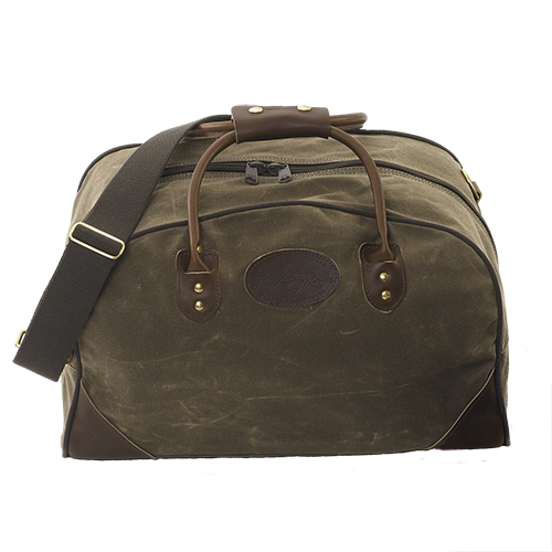 Traditional luggage bag with premium leather, field tan waxed canvas, and solid brass attachments.