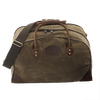 Traditional luggage bag with premium leather, field tan waxed canvas, and solid brass attachments.