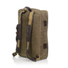 On the backside, there are two waxed canvas straps with several cotton webbed loops for accessories. Above the waxed canvas straps there is additional cotton webbed strap for easy carrying.