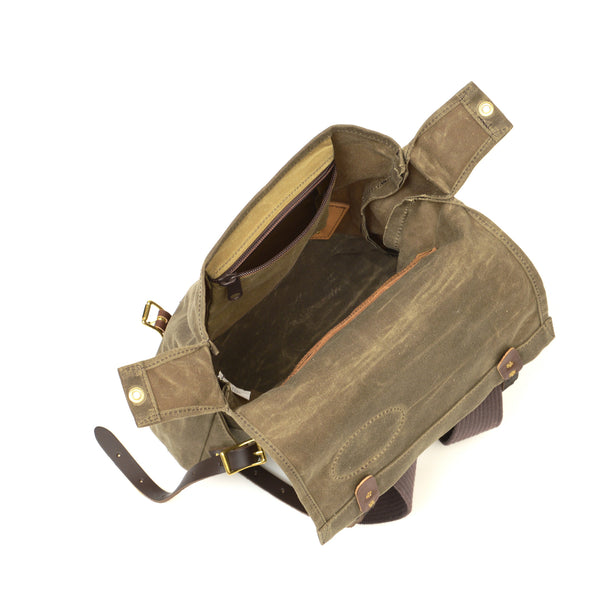 Inside the bag theres an additional zippered pocket attached to the top for extra storage and two top flaps to secure any load.