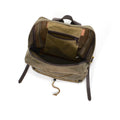 Inside the Itinerant Daypack there is a zippered pocket, made out of our high quality waxed canvas, hanging from the top. 