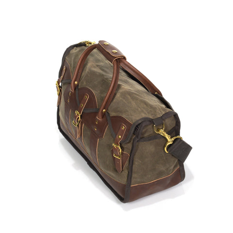 Versatile luggage bag, with premium leather reinforcements and detailing.