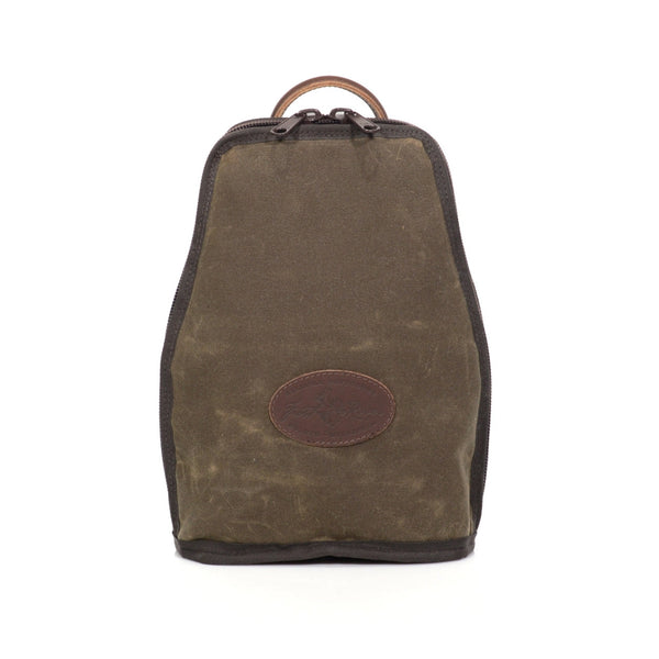The bottle tote is handcrafted with durable waxed canvas, premium leather and lined with sherpa on the inside to prevent breaking.