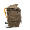 Top leather straps run horizontal around the sides of the top part of the lid and connect to brass buckles to cinch the opening down before placing the top flap over for additional security.
