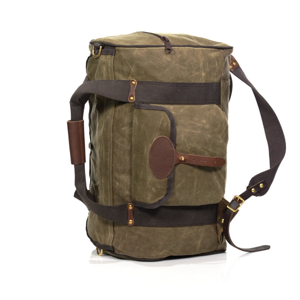 Luggage bag with grab handles and backpack straps.
