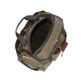 Duffel bag with a large main cavity closed by a heavy duty coiled zipper and a snapped dustcover for additional protection from water and dirt.