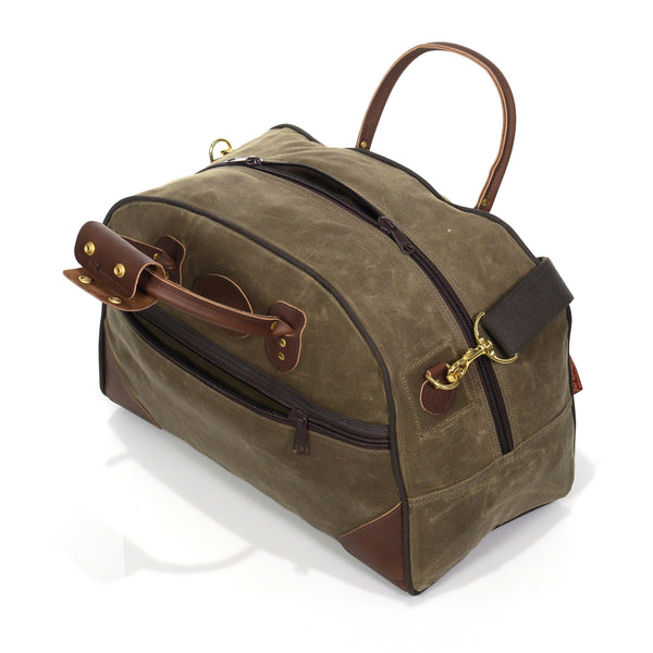 Large luggage bag with zippered top, and side pockets.