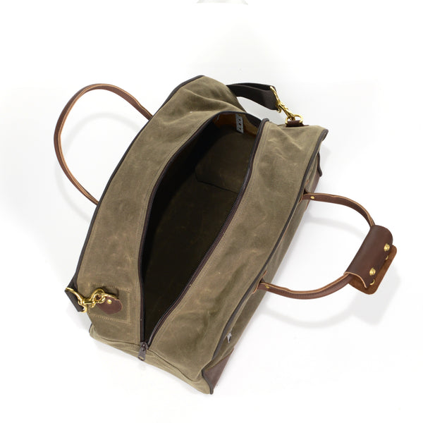 Large luggage bag with accessible zippered opening.