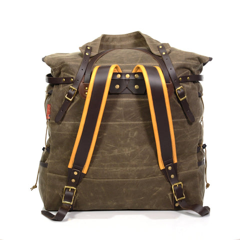 The Grad Portage Canoe Pack includes premium padded buckskin shoulder straps.