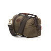 The handle straps on the tool bag version of this bag are sewn on all the way to the bottom to ensure it can carry a very heavy load.