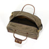 Luggage bag with large zippered opening, and premium leather grab handles.