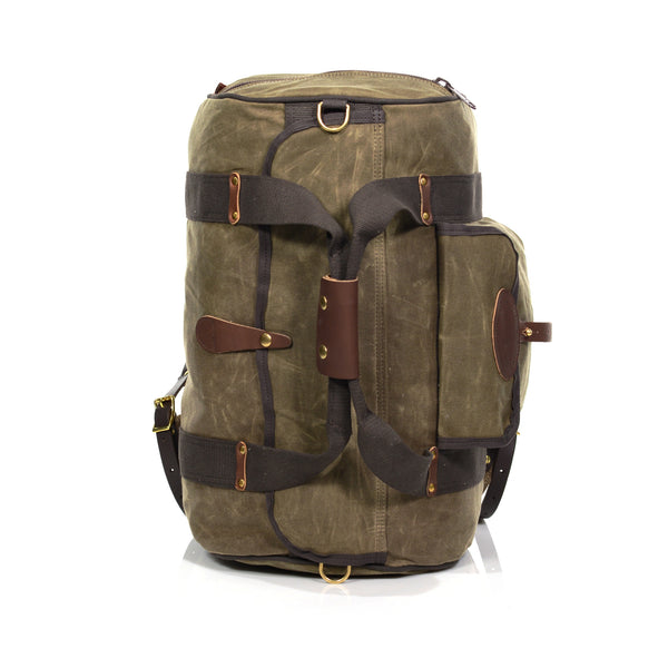 Waxed canvas luggage bag, with premium leather and solid brass accessories.