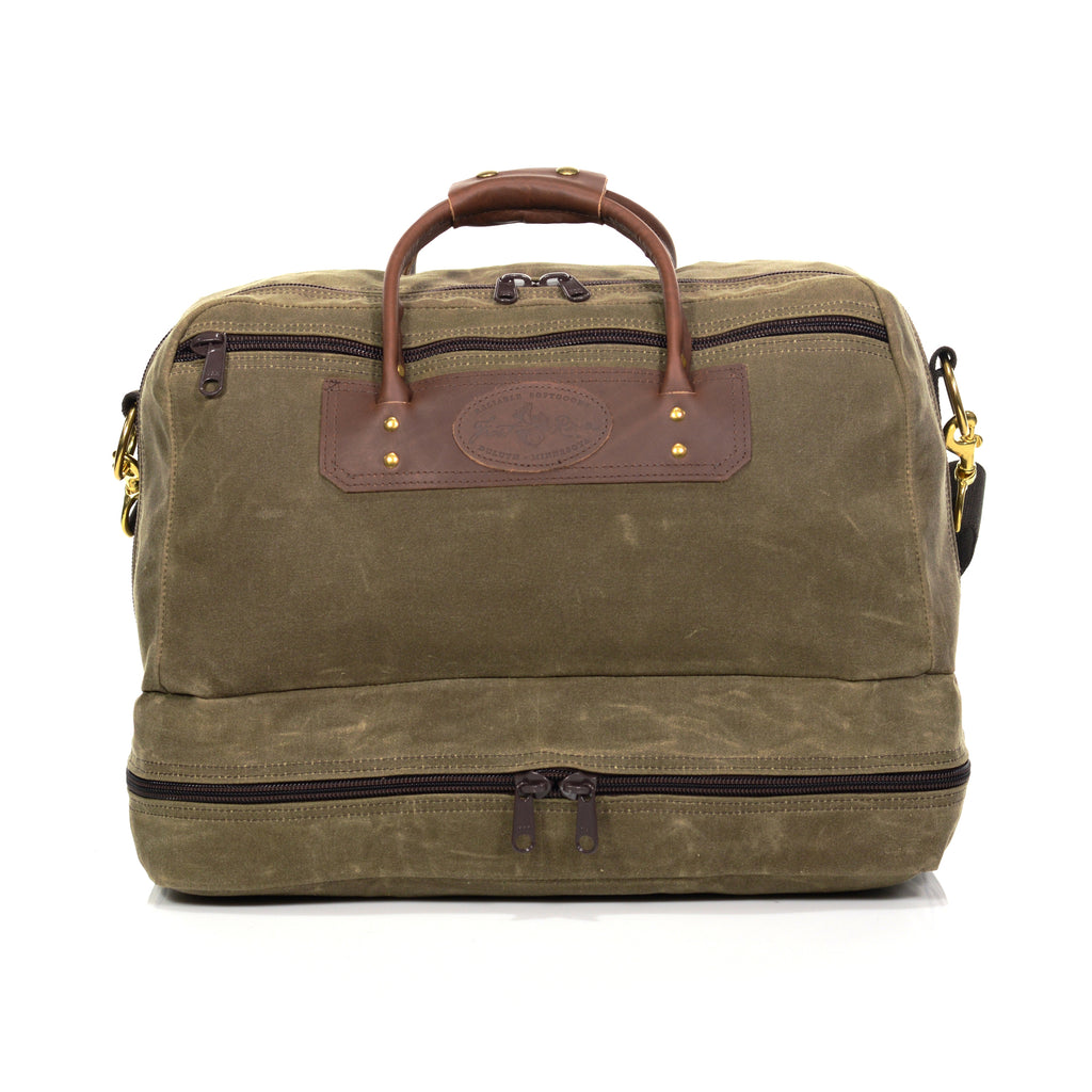 The Prairie Boot Bag is the perfect travel bag with a large zippered pocket on the bottom to store shoes, boots, or other accessories you might not want with your cloths.