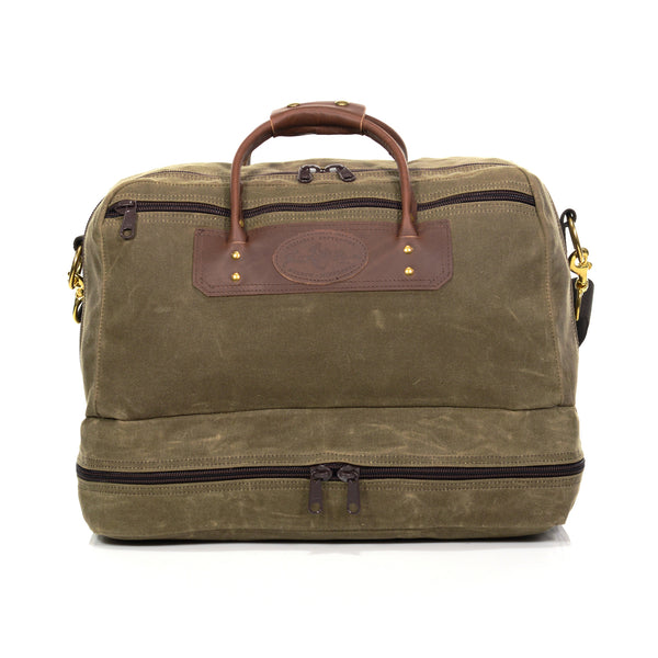The Prairie Boot Bag is the perfect travel bag with a large zippered pocket on the bottom to store shoes, boots, or other accessories you might not want with your cloths.