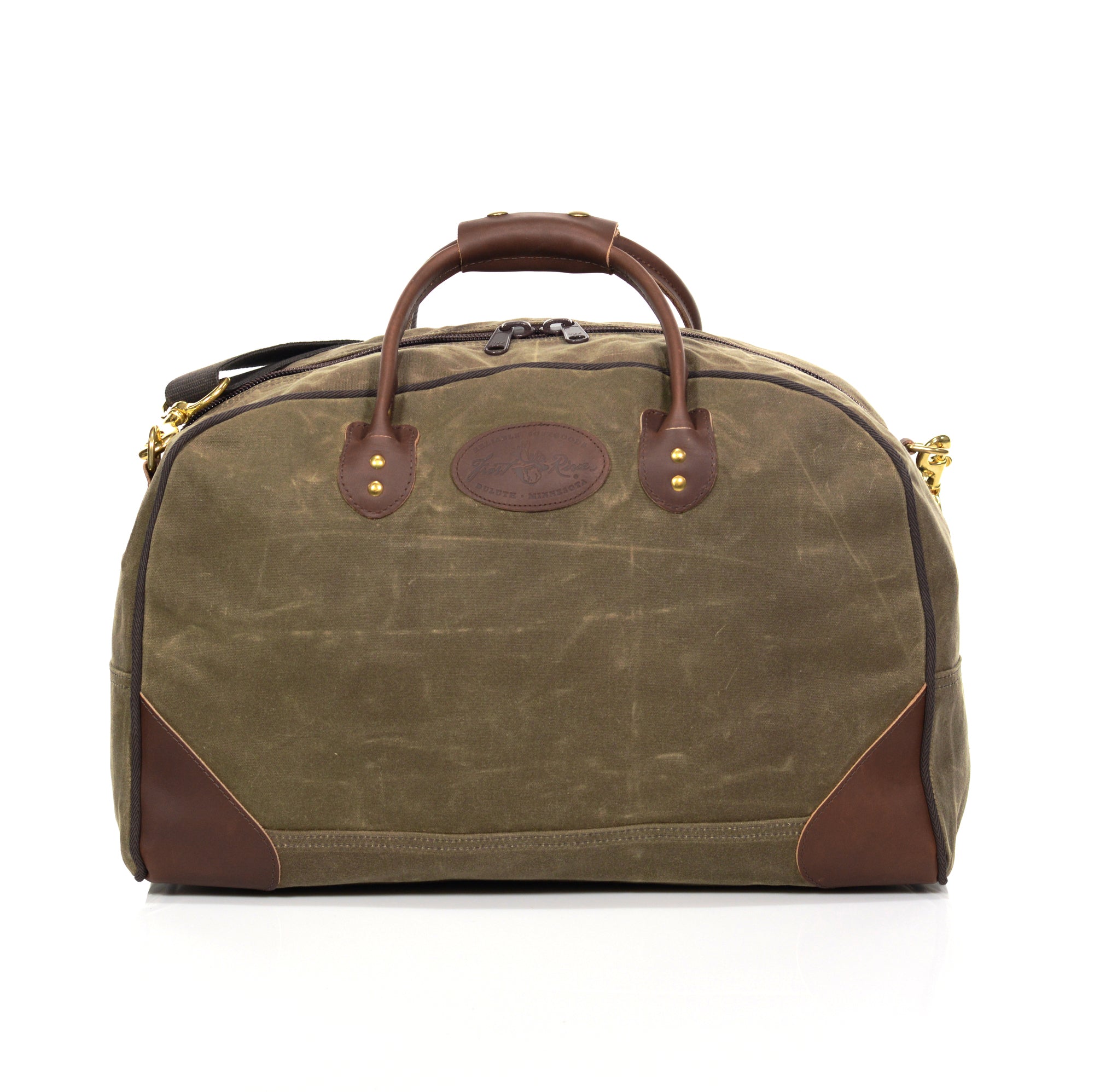 Luggage bag made with durable waxed canvas and premium leather.