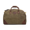 Luggage bag made with durable waxed canvas and premium leather.