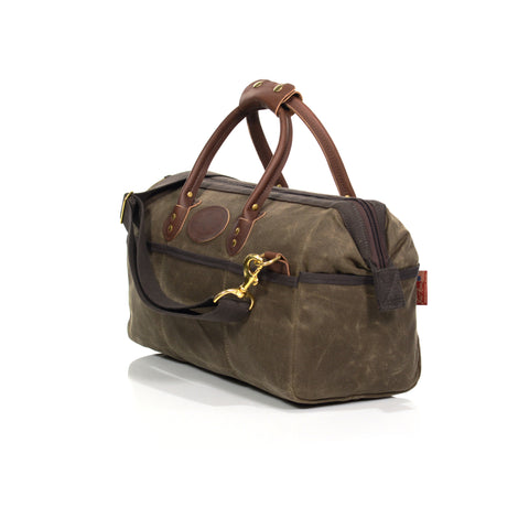 The carry-on luggage version of the Gladstone bag has strong leather handles attached by solid brass rivets and strong nylon stitching.