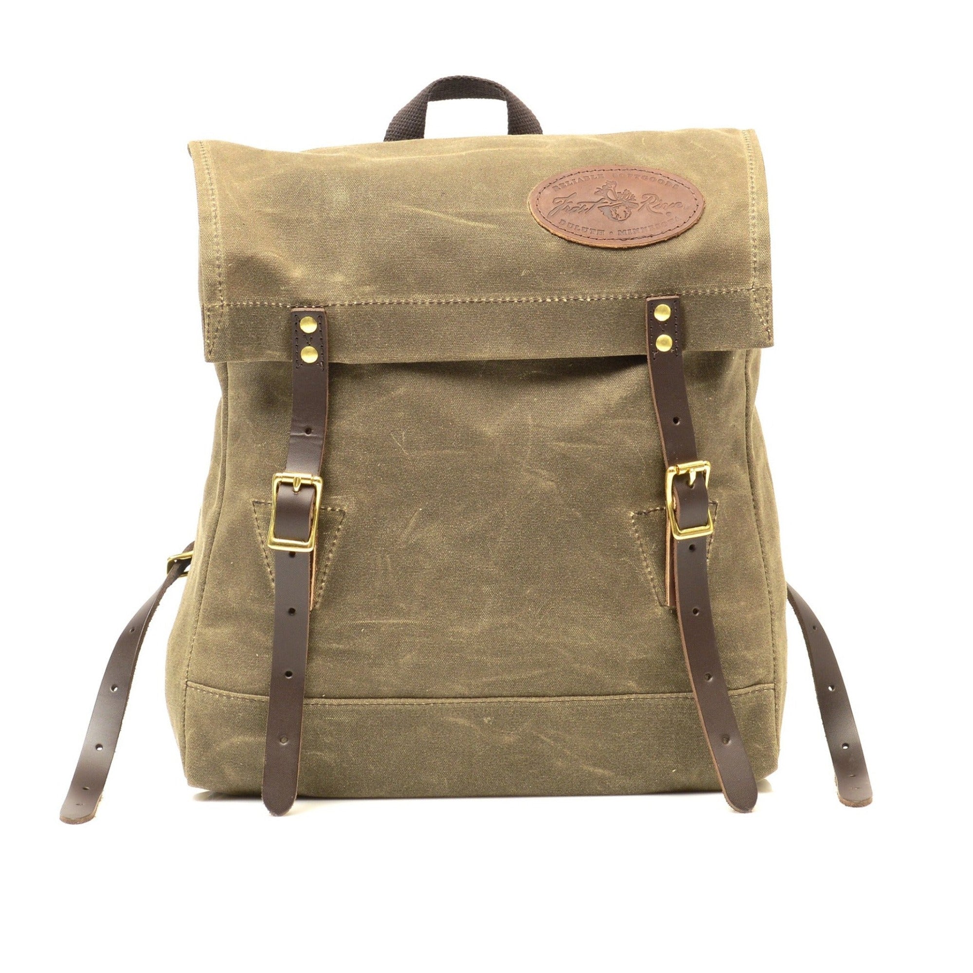 The Book Bag a small but tough box style bag. Made out of our forest green waxed canvas. With two premium leather straps that can be tightened with our high quality brass buckles.
